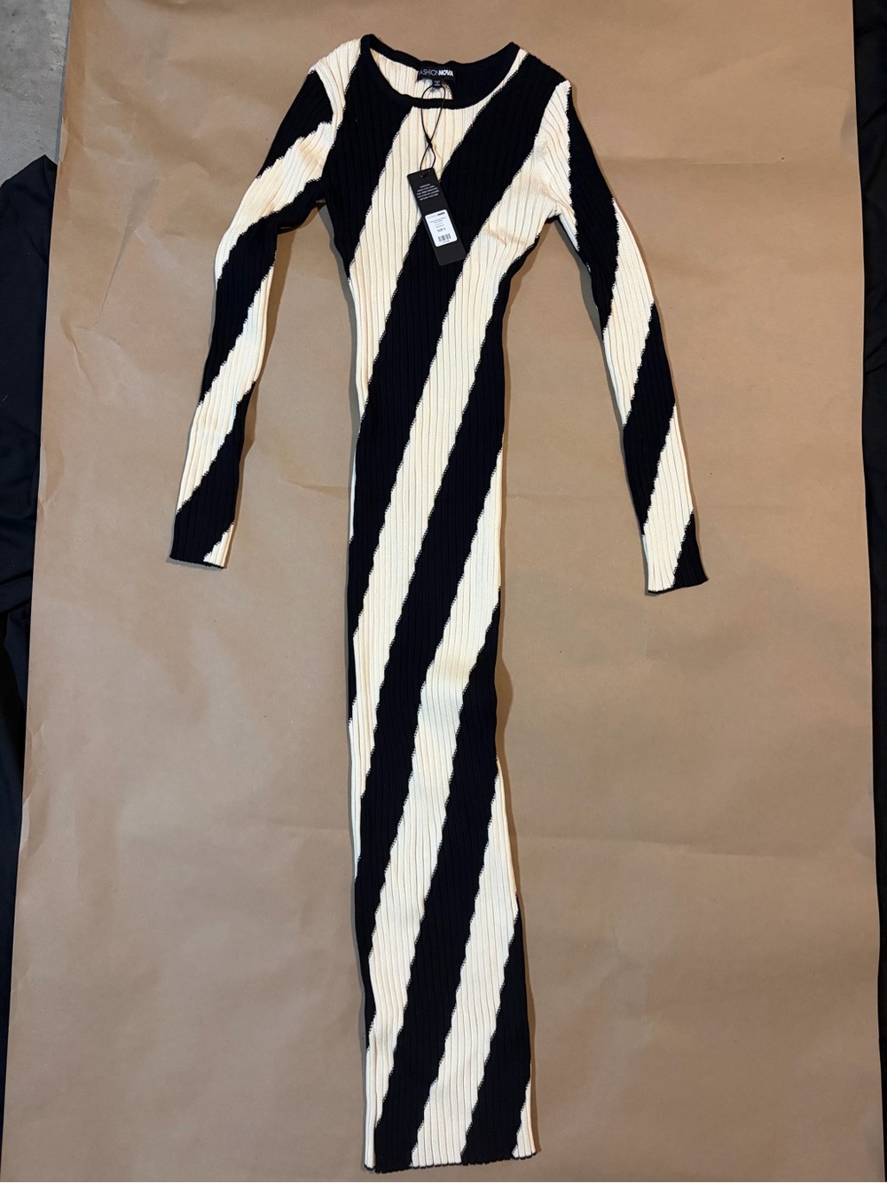 Fashion Nova Black and Cream Ribbed Diagonal Stripe One-Piece